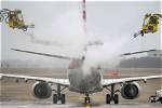 Flights Canceled, at Least 2 Dead as Ice Storm Freezes Us